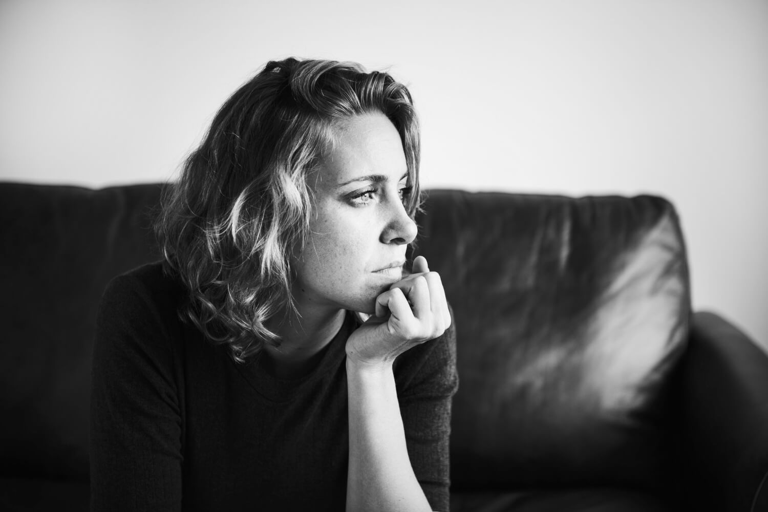 Woman struggling with PMDD.